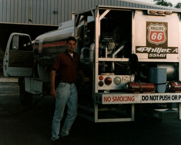 "After college graduation, 1995, pumping gas on the flightline of Ramp 66, North Myrtle Beach airport, South Carolina to pay for additional flying."