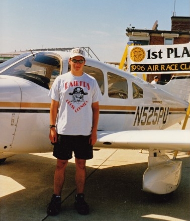 My freshman year in college, in front of one of the Piper Cherokees I was training in. (1997)