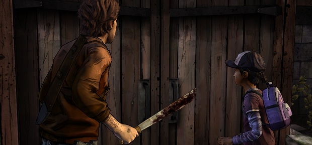 Clem looking at a barn door.